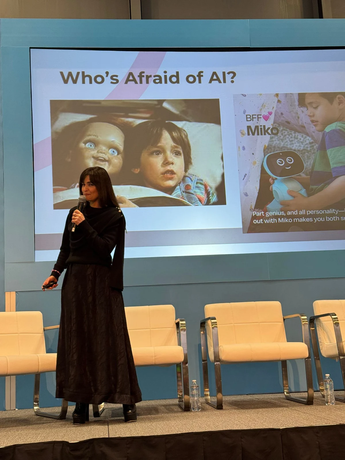 Hamutal delivering her talk beside a slide asking Who’s Afraid of AI